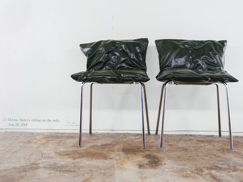 Merias Sisters sitting on chair.Aug 28,2001(compression time series)